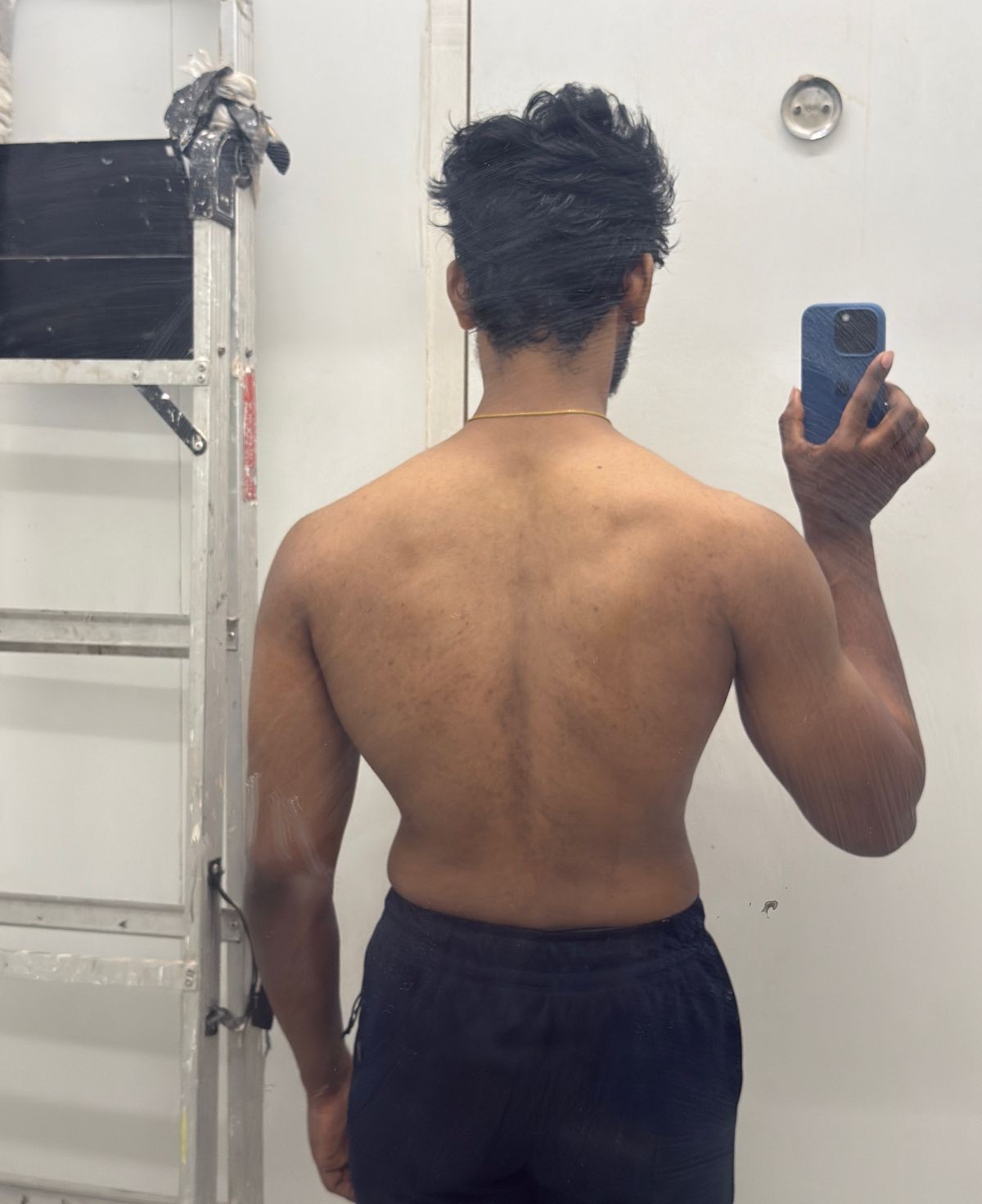 Client back physique before transformation with LOKIVERSE online coaching