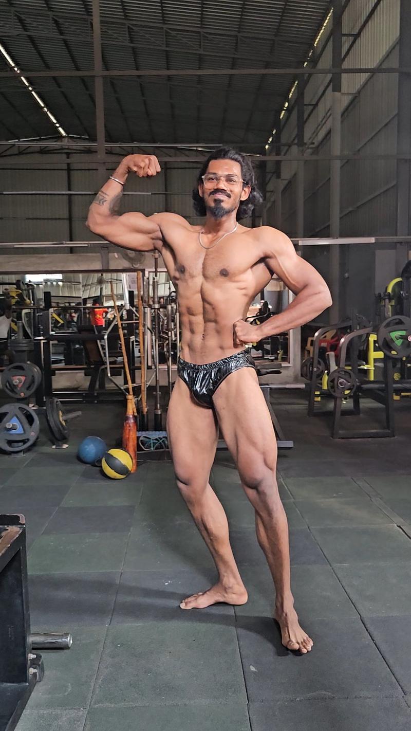 LOKIVERSE competition prep athlete front double bicep pose ICN India 2026